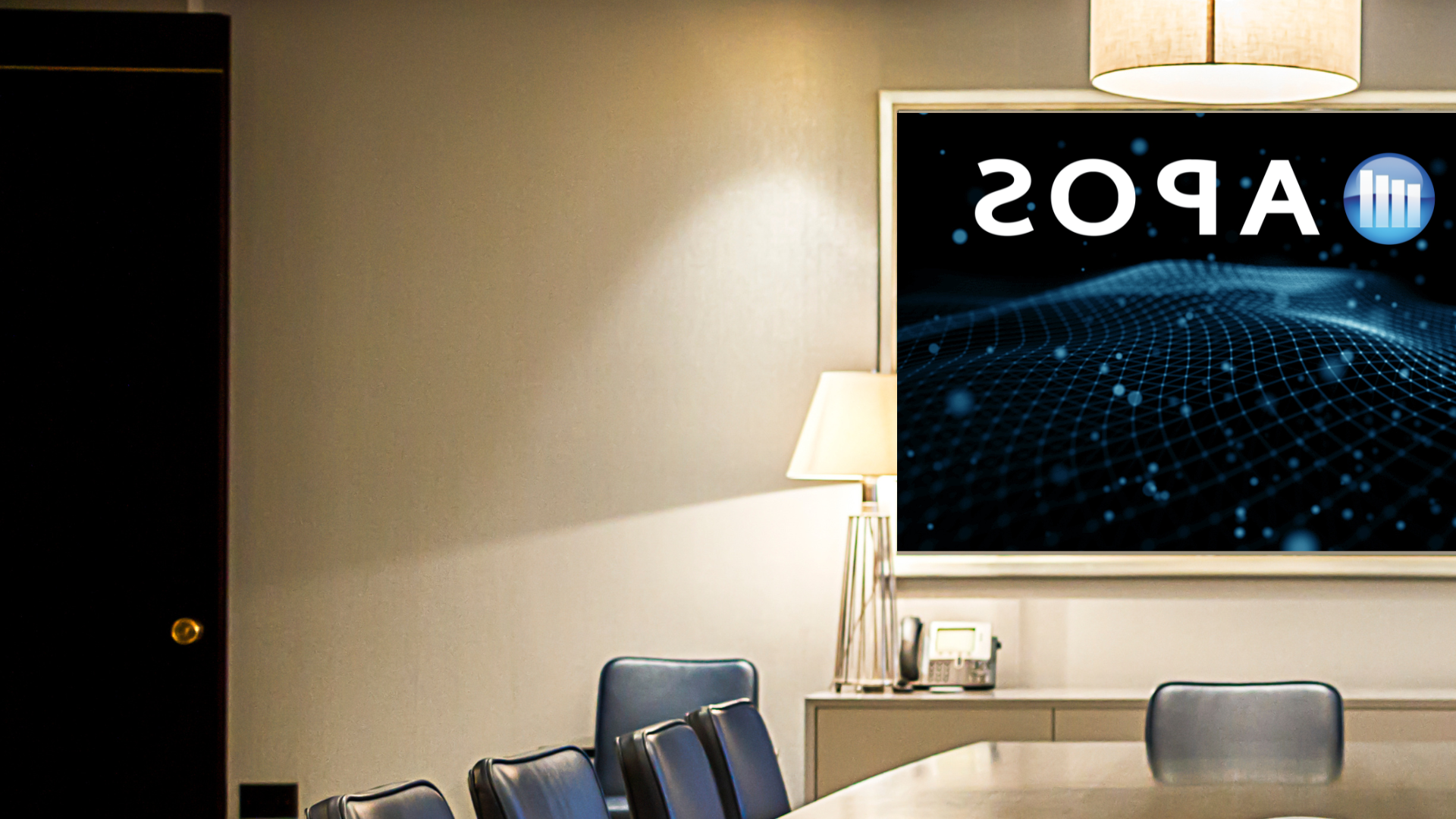 empty boardroom, short tabke view, APOS logo on back screen